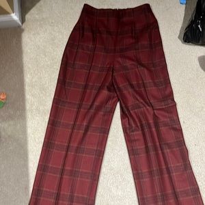 Made of wool and cashmere.  Never worn, they run more like a size 4.  Very chic.